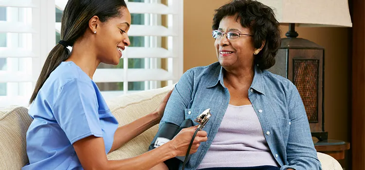 Caregiver helping senior